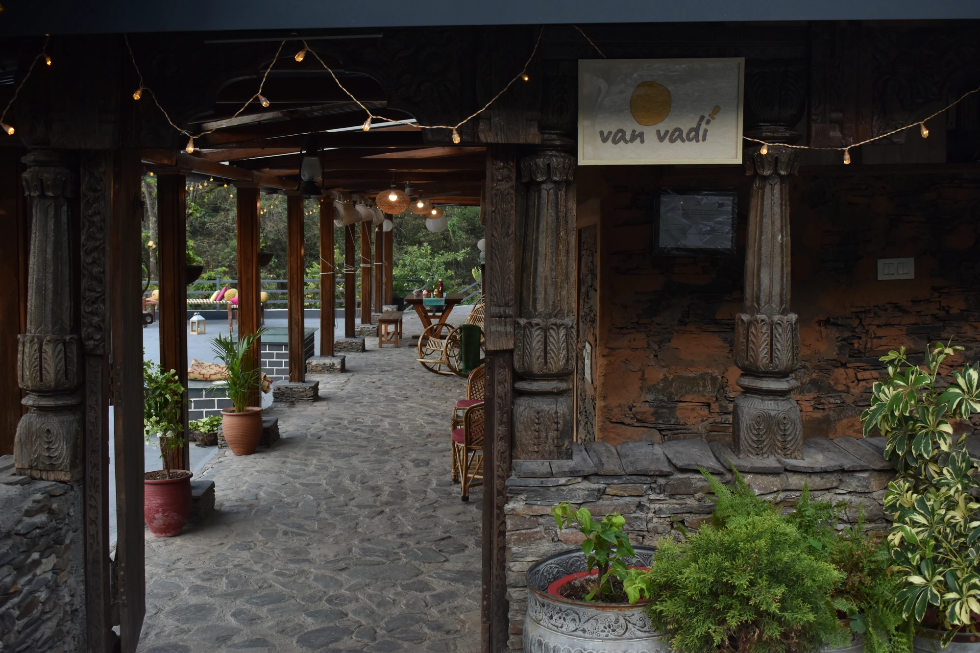 Carved wooden pillars at the entrance of the property